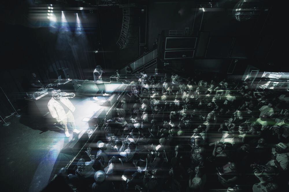 Looking down on a packed floor and the stage at The Pearl